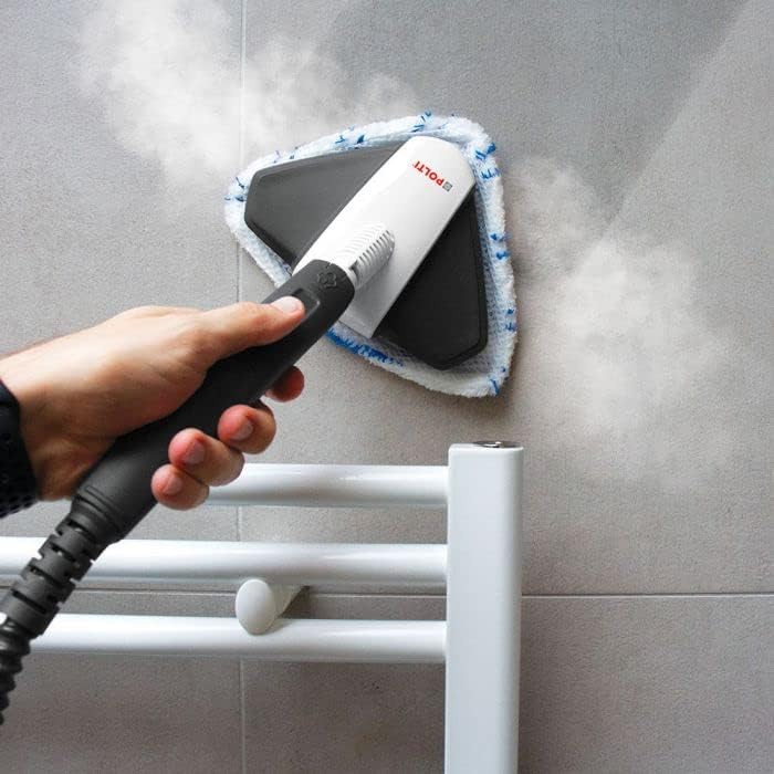 Polti Vaporetto Style SV660 handheld unit cleaning a radiator