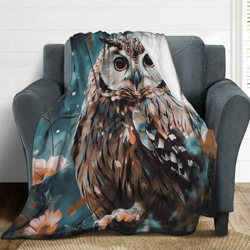Couverture microfibre hibou pour des soirées cocooning sur le canapé