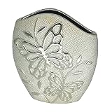 Medidas: 20 cm x 6,5 cm x 17 cm Material: Ceramica Peso neto: 735 grs.