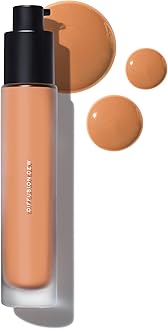 MAKE Beauty Diffusion Dew Skin Tint. Sheer to Medium Coverage Radiant Finish. Blurring, Smoothing, and Brightening for Glowing Complexion. Enhanced with Niacinamide and Adenosine. Suede 12
