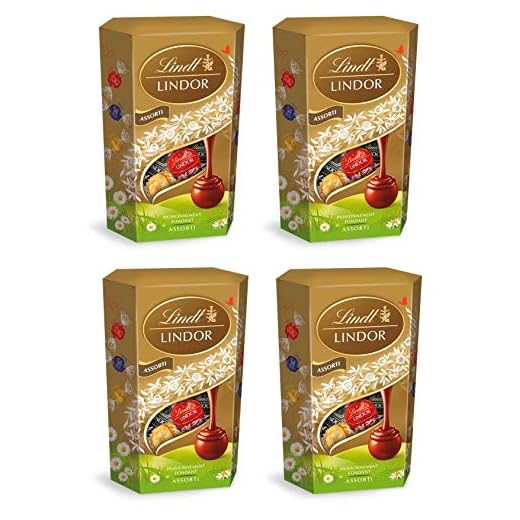 Lindt Lindor Cornet de 16 boules fondantes au chocolat au lait, noir et blanc pour les chocolats de Pâques 200 g - Lot de 4