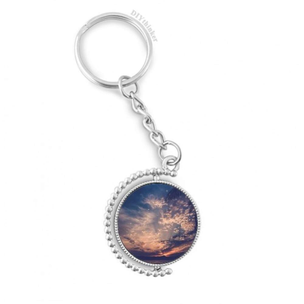 Llavero rotativo contra pérdida de llaves con diseño de cielo azul visible 4