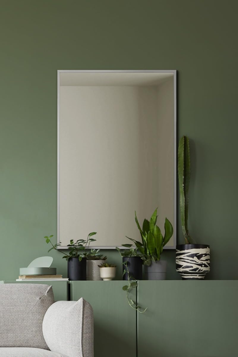 Miroir mural moderne 60x40 cm avec bords en aluminium pour sublimer l'entrée