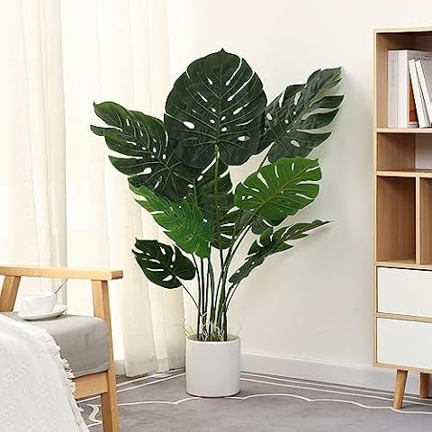 FLOWORLD Artificial Monstera Plant 4FT Tall Fake Swiss Cheese Potted Faux Tropical Floor Plants Indoor Decorative House Palm Trees for Home Office Living Room Decor Cover