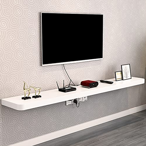 Étagères DVD et console bien rangées sur un support TV flottant blanc