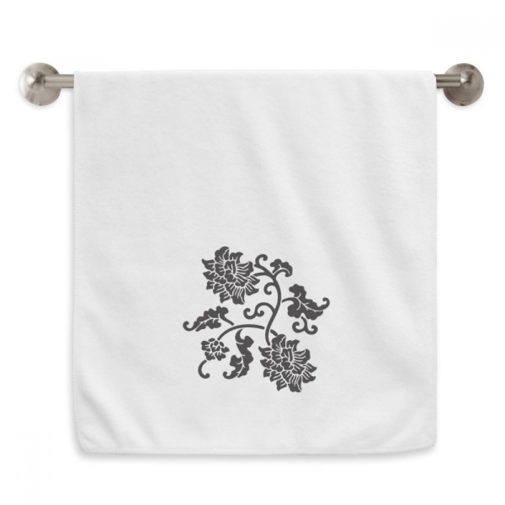 Serviette fleurs noir plante douce pour peaux sensibles visage blanc