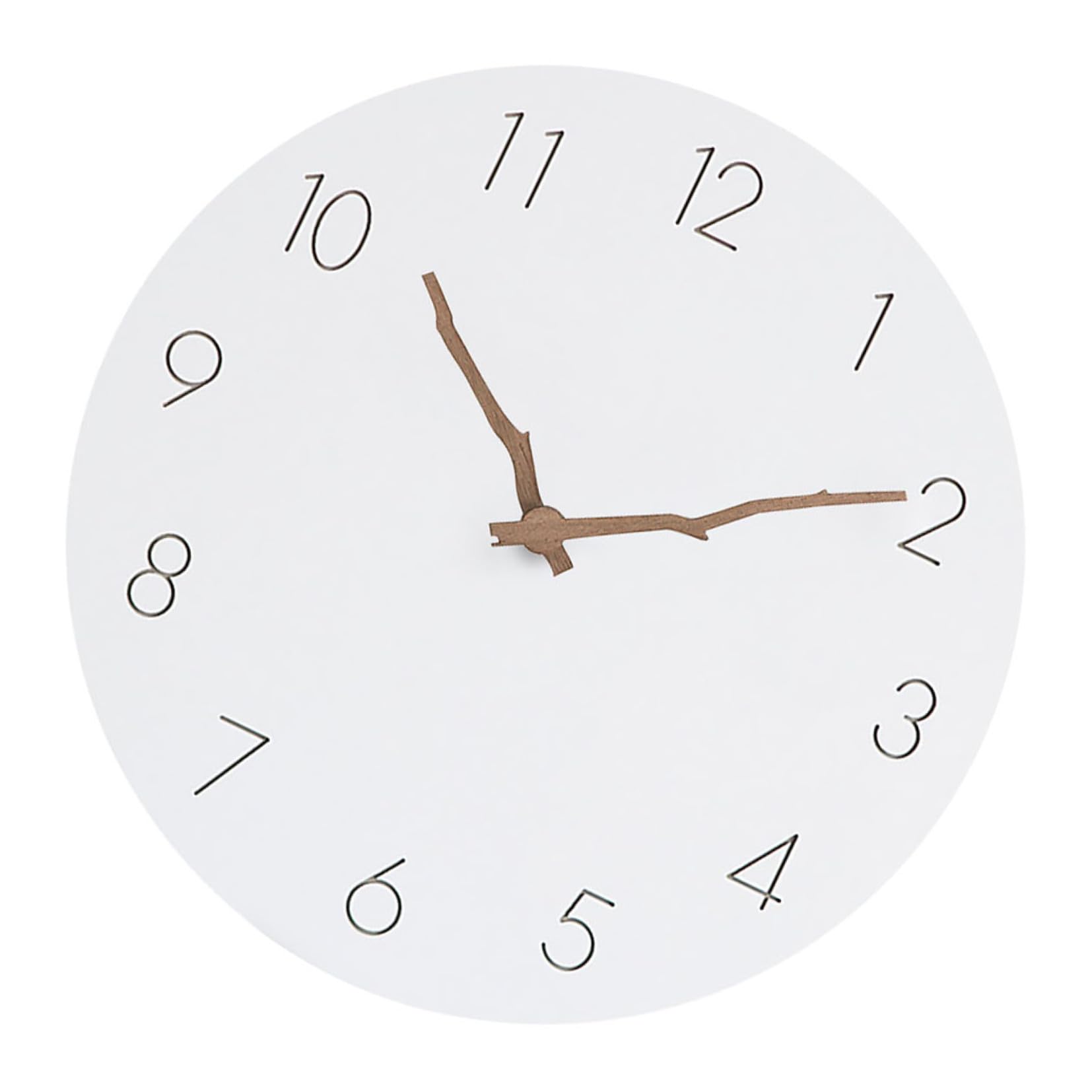 Pendule murale élégante pour salon moderne au design de branche