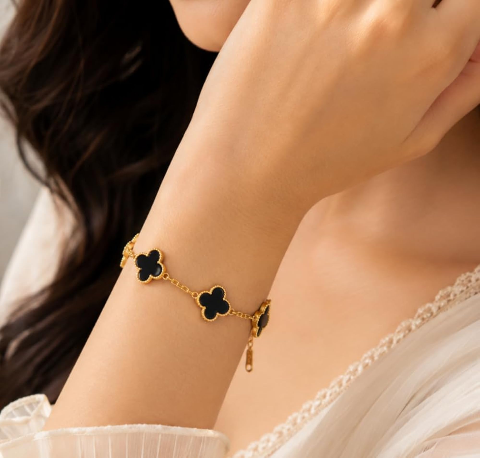 Gold-Tone Four-Leaf Clover Bracelet with Motifs