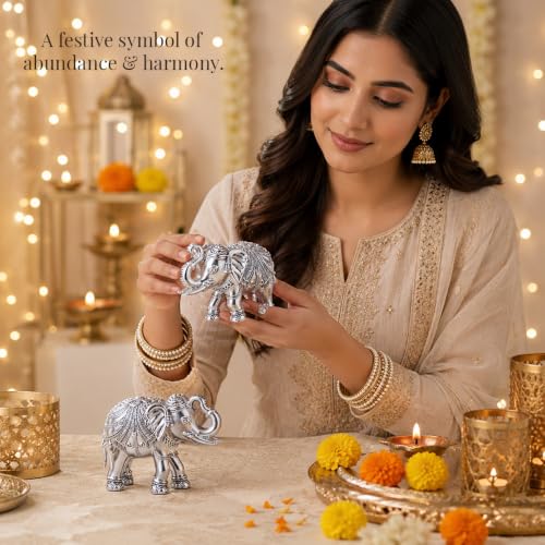 Image of DIVINITI 999 Silver Plated Elephant Pair Showpiece | Luxury Velvet Gift Box Included | Antique Finish Vastu Decor for Prosperity & Good Luck | Home, Office & Temple Decoration | 9.5 x 13 cm