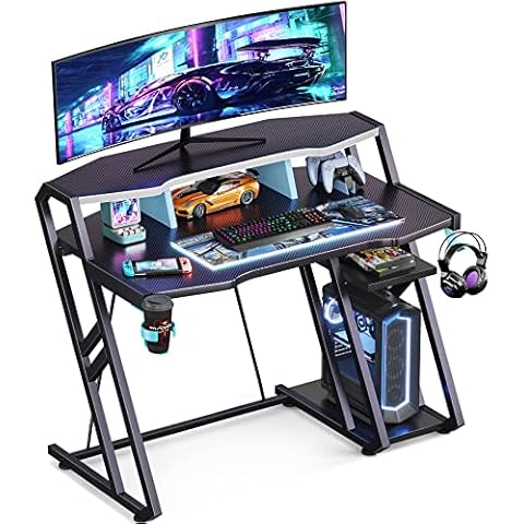 MOTPK Gaming Desk with Storage Shelf 39 inch, Computer Desk with Monitor Shelf, Gaming Table with Carbon Fiber Surface, Gamer Desk with Cup Holder & Headphone Hook, Gift for Boys Men, Black Cover