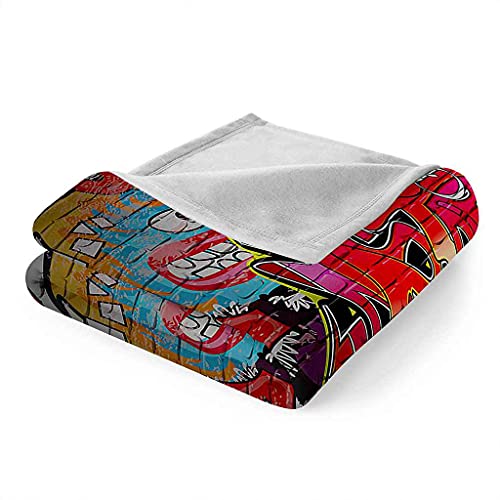 Couverture flanelle graffiti contre le froid du canapé et du lit