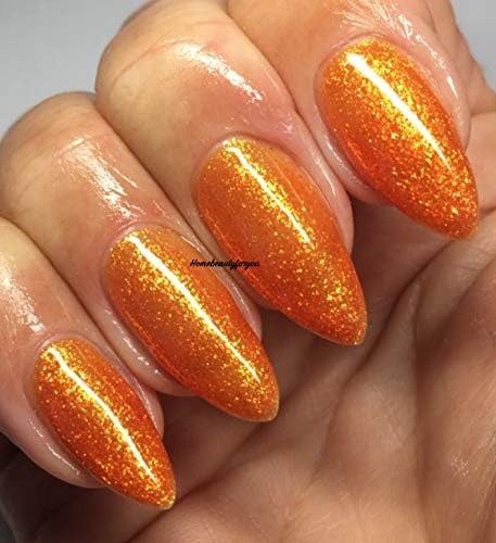 Hand with Bluesky JQ07 Orange Gold Shimmer Gel Polish applied