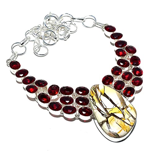 Collier lourd en jaspe Picasso et grenat pour sublimer un décolleté fatigué