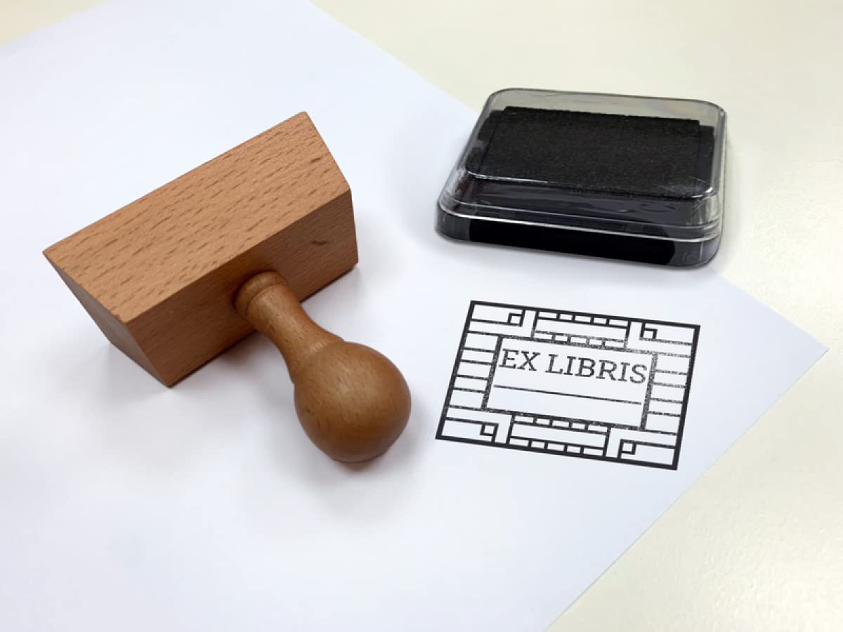 Sello exlibris con mango. El sello del lector