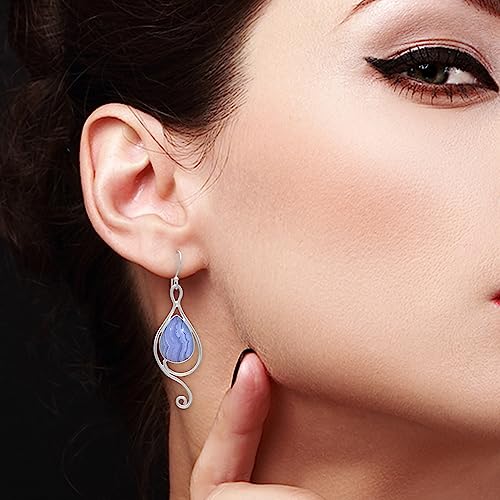 Boucles d'oreilles poire argent sterling artisanales et élégantes