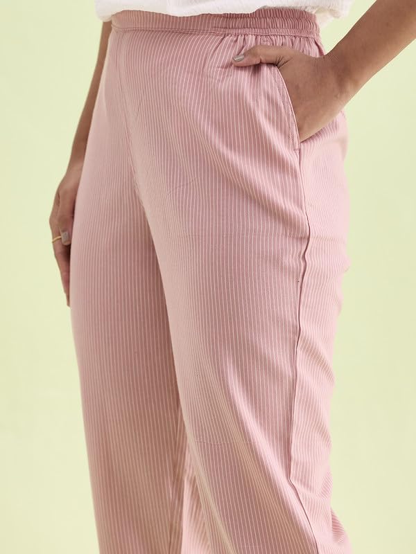 Image of GO COLORS Ikat Print Beige Printed Pencil Pant for Women | Breathable, Side Pocket