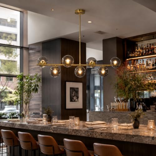 Image of KCO Mid Century Modern 7 Light Brass Gold Linear Sputnik Chandelier | 31.5 inch Rod for Sloped Ceiling 7W 3000K E26 Bulb Included, Smoke Gray Glass Globe Pendant Light Fixture for Kitchen Dining Room
