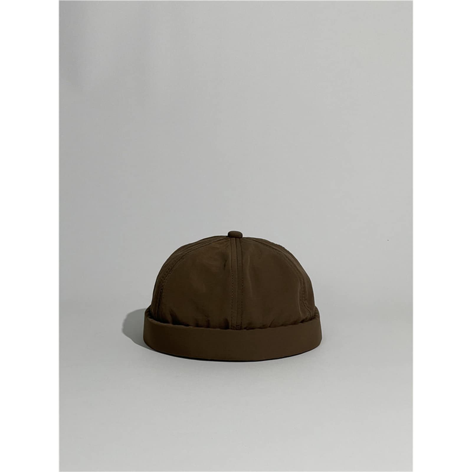 Bouchon de pelage mince et casquette en vachette contre le vent frais du matin