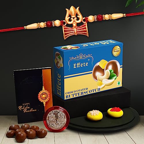 Image of DeoDap Multicolor Trishul Rakhi Bracelet Roli Chawal with Chocolate Butter Scotch 32gm, Silver Pooja Coin, Tilak Set, Greeting Card - Rakhi Gift for Brother
