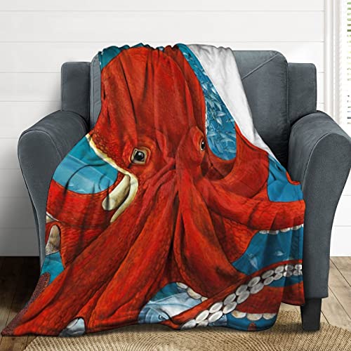 Couverture polaire pieuvre rouge pour vos soirées cocooning sur le canapé