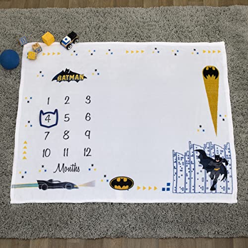 Image of Warner Brothers Batman White and Black Batmobile, Gotham City, and Bat Signal Milestone Baby Blanket