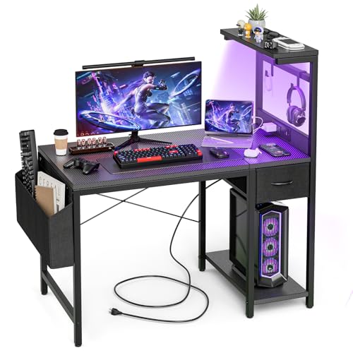 Grandder Escritorio Gaming 120x50 cm con Enchufe LED RGB Estantes Abatibles Cajón Organizador para PC Portátil Hogar/Oficina Incluye Bolso Fibra Carbono Negro