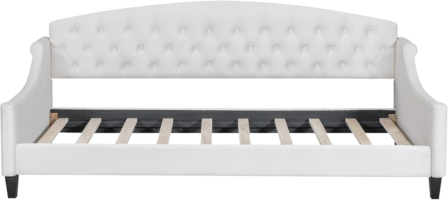 Ön view of the daybed frame without mattress, showing the tufted headboard and side arms.