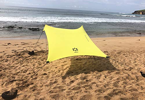Image of Neso Portable Beach Tent Sun Shelter with Sand Anchor - Lightweight Beach Shade Canopy - Easy Setup for Family Outings - Patented Reinforced Corners - UPF 50+ Sun Protection - 7 x 7ft - Lemon