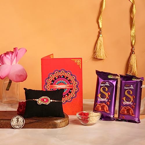 Image of Frostick Designer Rakhi With Chocolate Gift For Bhaiya /Bhai /Brother With Greeting Card, Tilak Chawal And Silver coin (Diary Milk Silk 2pcs, Pack of 1) (Random Design Rakhi),150 G