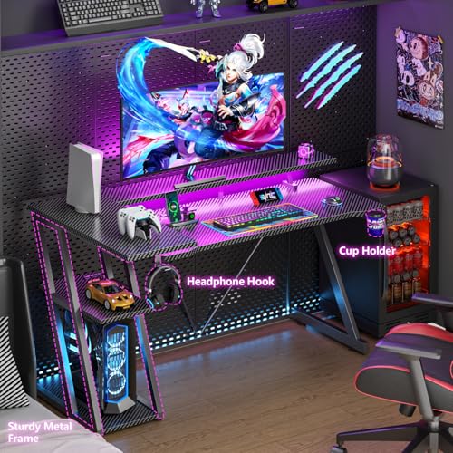 Image of Korfile 55 Inch Gaming Desk with Power Outlet & LED Lights, L Shaped Gamer Computer Table with Storage Shelves for Bedroom, Corner Home Office Desk, Carbon Fiber Black