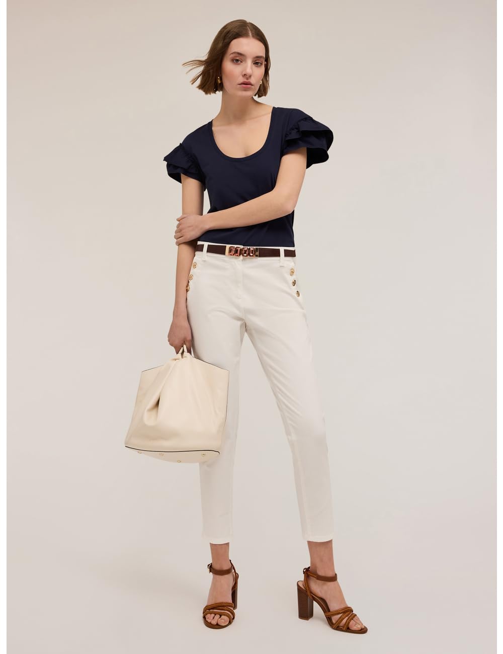 Motivi: Pantaloni Regular con Bottoni Metallici Stagione Primavera Estate 2025.