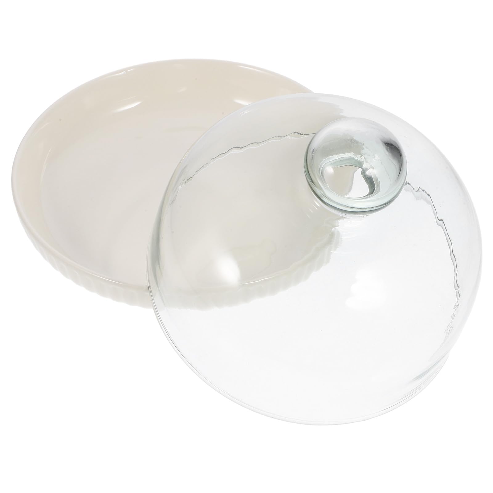 Cloche en verre pour préserver vos gâteaux sur ce plateau en céramique de 18 cm