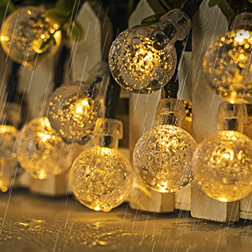 Koopower Lot de 2 lampes solaires étanches avec 50 boules de cristal LED sur une guirlande verte de 8 m (blanc chaud)