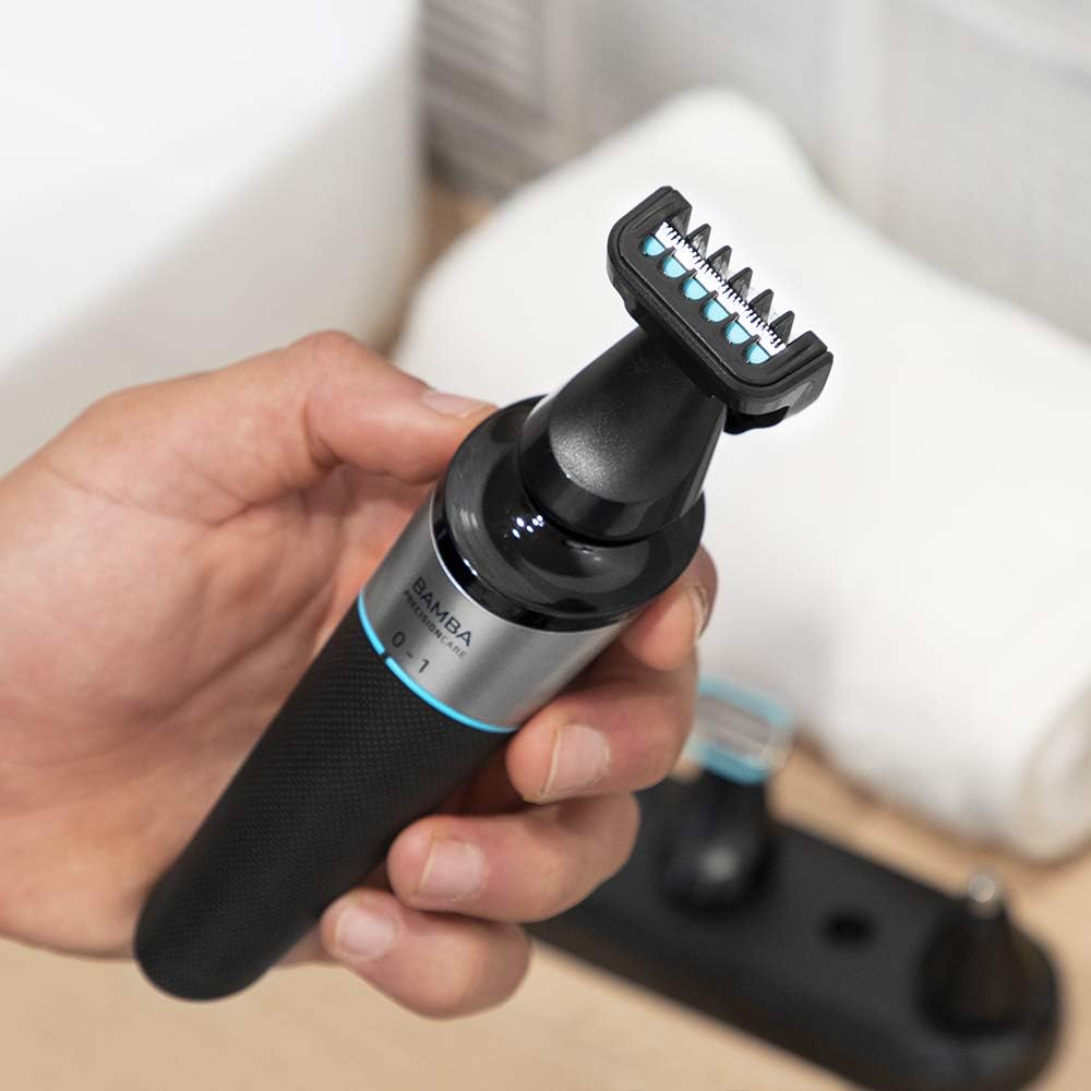 Hand holding the Cecotec Bamba PrecisionCare shaver with the precision trimmer head attached
