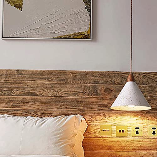 Lámpara colgante de metal blanco que aporta luz focalizada en el comedor 8