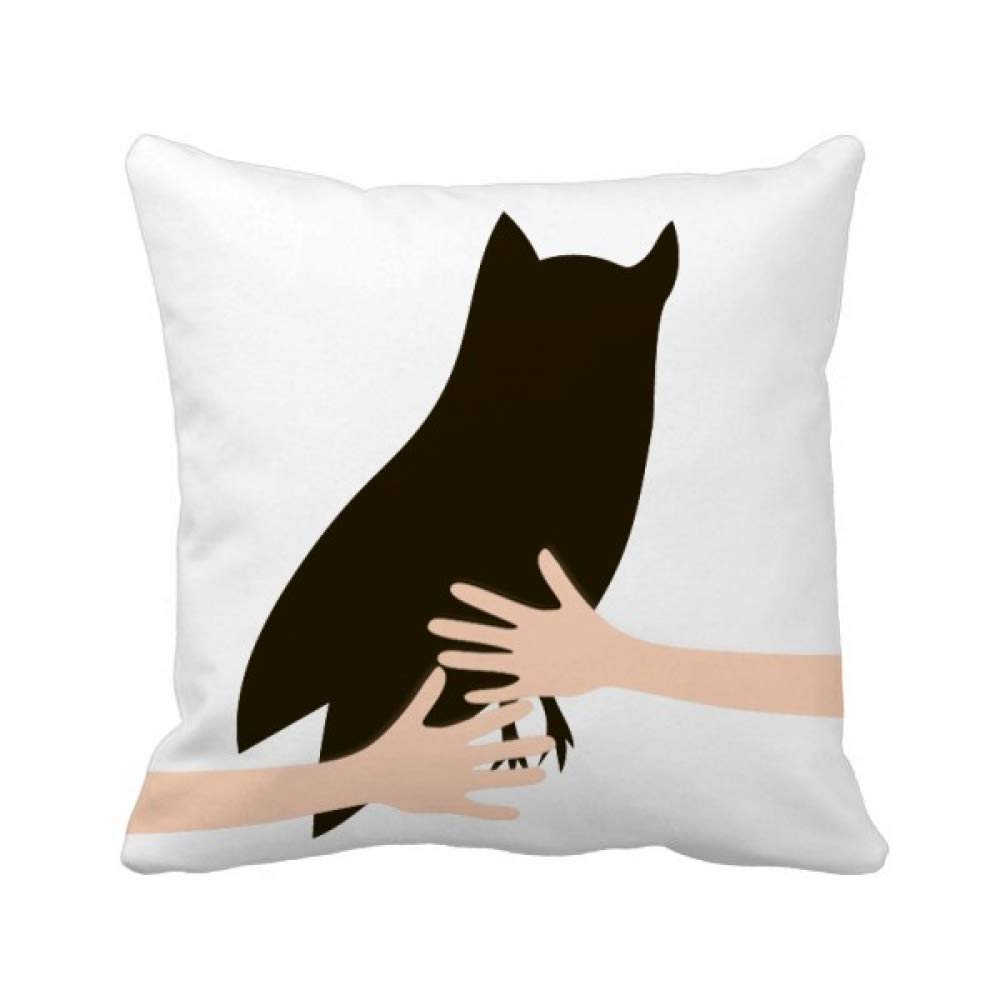 Coussin chouette noir portrait tendre pour une ambiance chaleureuse