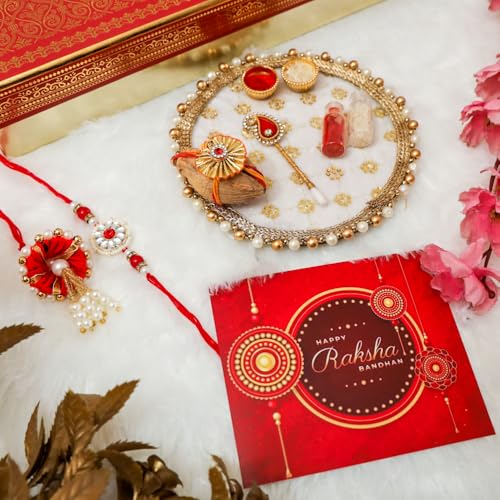 Image of NUTRISNACKSBOX Rakhi Gift Hamper Red for Brother & Bhabhi | 14 Items Premium Gift Box | Dry Fruits, Cookies, Chocolates, 2 Rakhis & Lumba