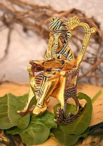PAYSTORE Handcrafted Metal Golden Lord Ganesha Statue Sitting On A Rocking Chair and Reading Ramayan | Figurine of Lord Ganesh for Positive Environment, Home, Office and Shop Decorative Showpiece