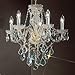 Monticello 5 Light Chandelier Crystal Trim: Crystalique, Finish: Chrome