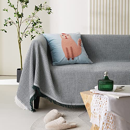 Couverture gaufrée douce pour ne plus avoir froid sur le canapé-lit