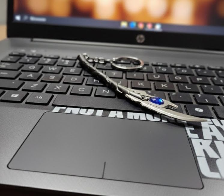 Image of Metal Sword Keychain with Blue Gem, Silver, Twisted Handle Design, Dagger Style Accessory