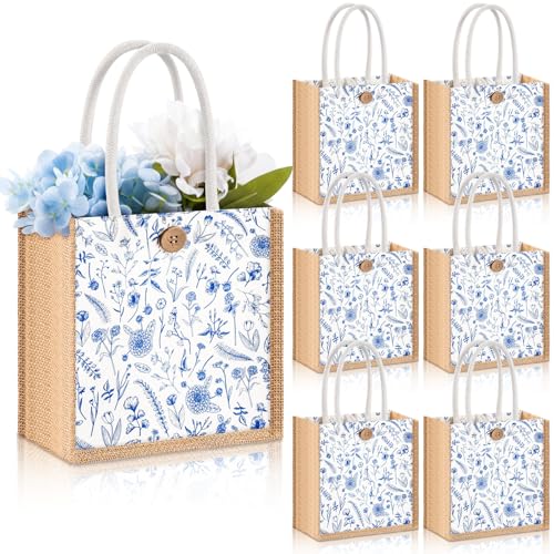 Sacs cadeaux floraux en toile de jute pour une décoration de table de mariage champêtre