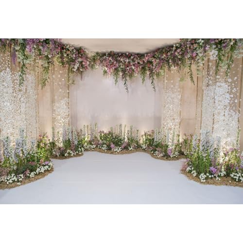 Grappes de fleurs et voilages pour cacher un mur et réussir vos photos de mariage