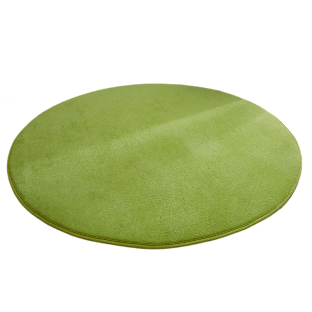Tapis rond en velours vert herbe pour réveiller la déco d'une chambre ou d'un salon
