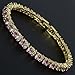 RIZILIA Eternity Tennis Bracelet & Round Cut Pink Sapphire Color Cubic Zirconia in 14K Yellow Gold Plated, 7 inch