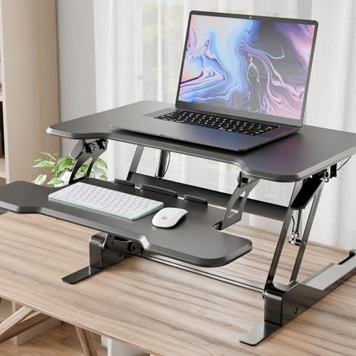 Image of Mount-It! Height Adjustable Standing Desk Converter, Compact 30 inch Wide Tabletop Standing Desk Riser with Gas Spring, Desktop Stand Up Workstation with Keyboard Tray Fits Monitor or Laptop, Black