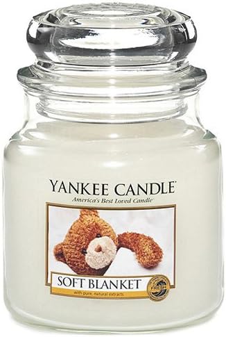 candela profumata con aromi di lusso