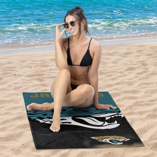 Image of Northwest NFL Jacksonville Jaguars Microfiber Beach Towel, 30 x 60 Inches - Quick Dry, Sand Resistant, Lightweight, Highly Absorbent, Incisor Design