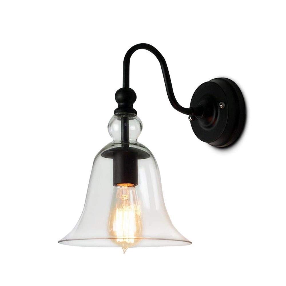 Lampe murale en verre pour illuminer un escalier sombre en métal