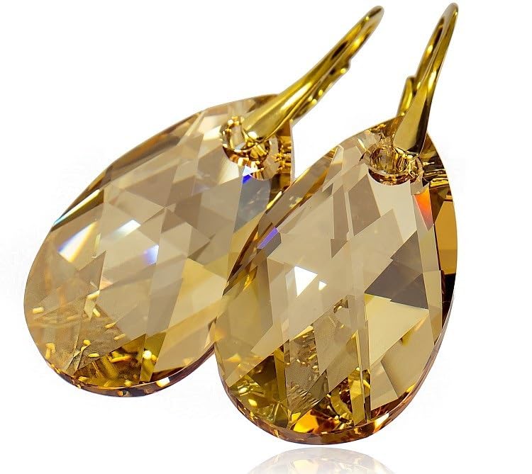 Lignes d'oreilles or 24k et cristaux : finis les bijoux lourds avec ces chaines d'oreilles légères